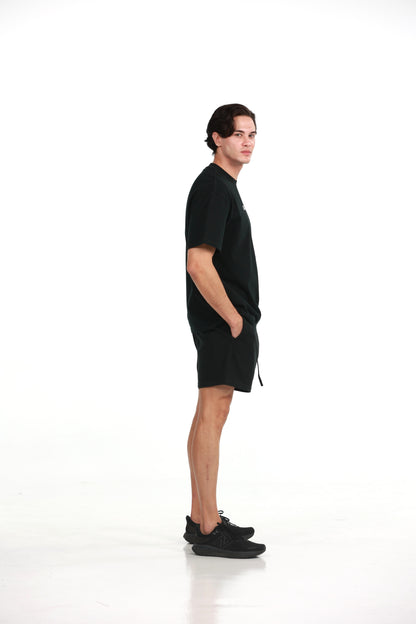 Workout Tee & Short Set in Black, side profile view on male model, Ascendia