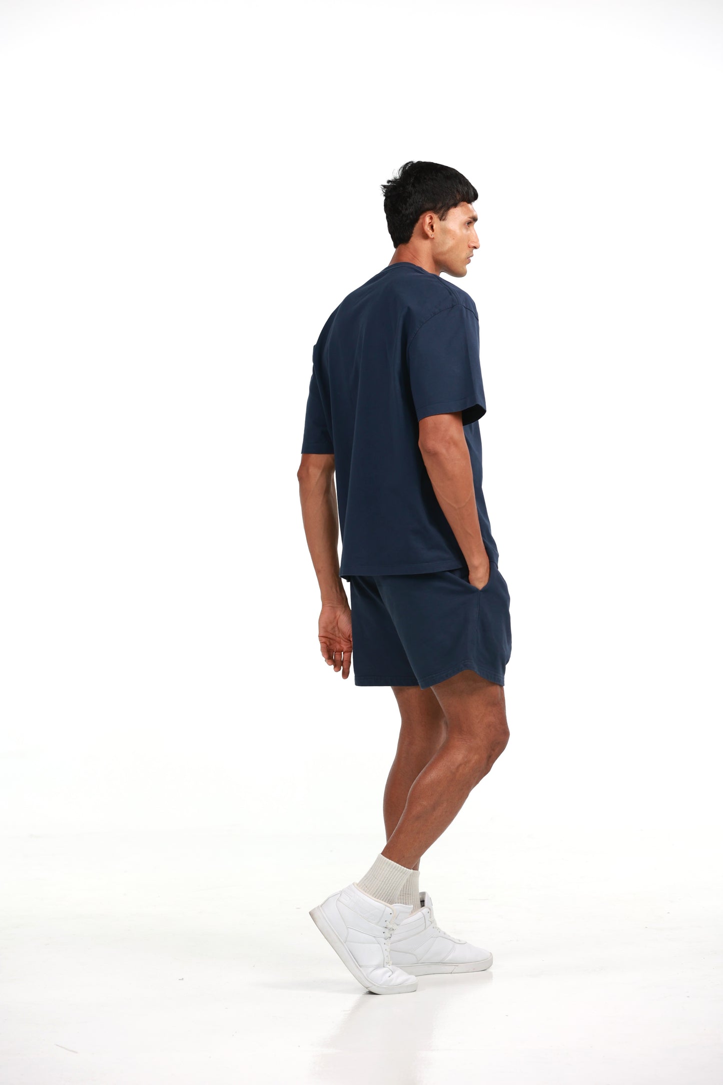 Workout Tee & Short Set in Navy, side profile view on male model, Ascendia