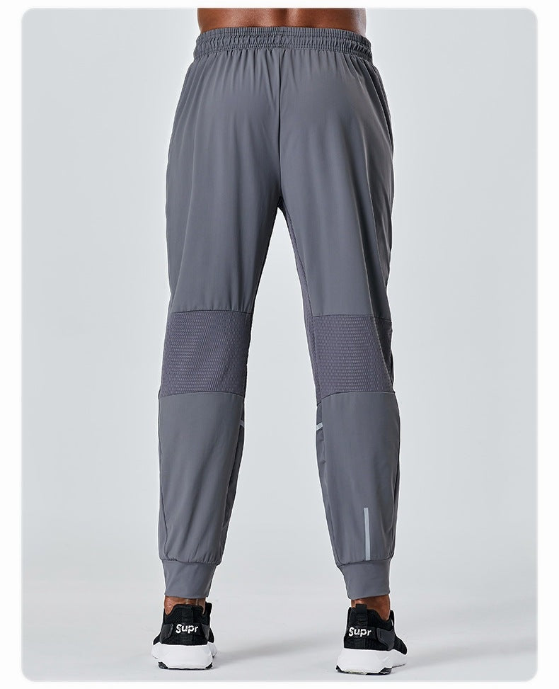 Men's running track pant - gray, Ascendia - back view