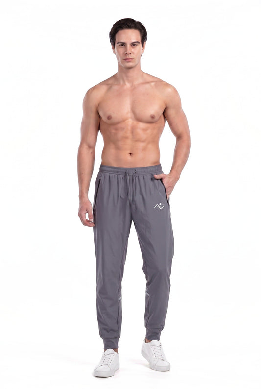 Men's Running Track Pants in Dark Grey, front view on male model, Ascendia