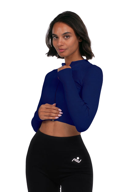 Seamless V-Cut Training Top in Ink Blue, detail of ribbed fabric and zip on model, Ascendia
