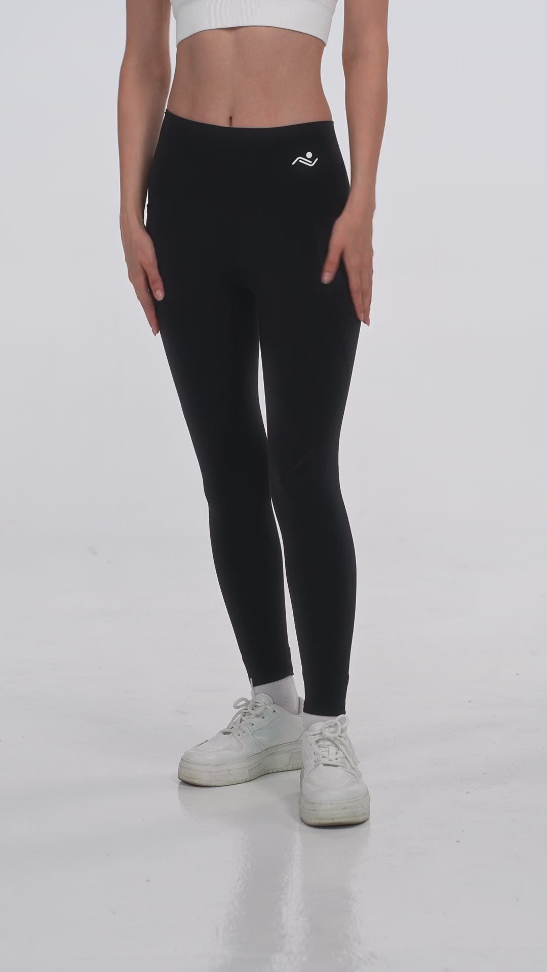 Active Fit Leggings in Black, video on model showing the side thigh pockets, Ascendia