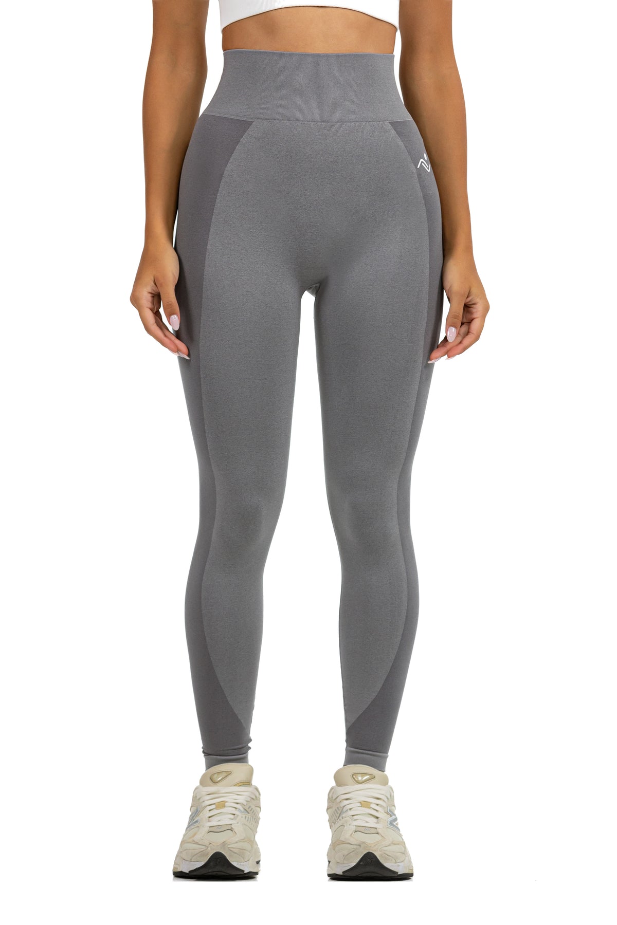 Seamless Ribbed Yoga Leggings in Dark Grey, front view on model showing the high ribbed waistband, Ascendia