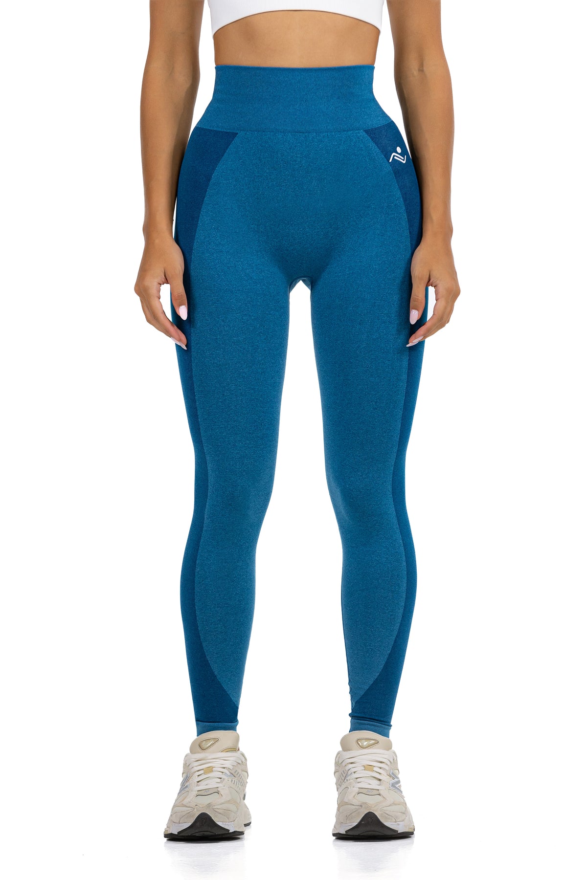 Seamless Ribbed Yoga Leggings in Petrol Blue, front view on model showing the high ribbed waistband, Ascendia