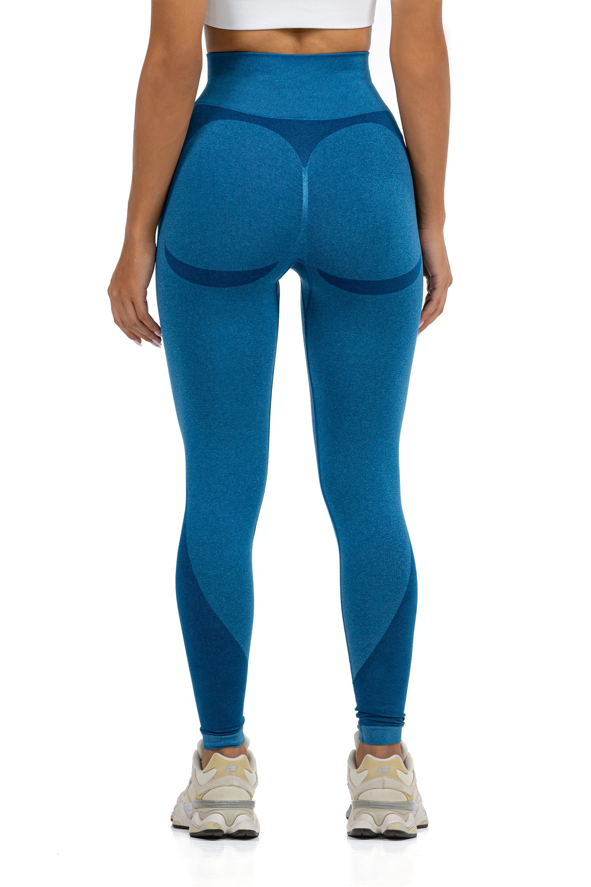 Seamless Ribbed Yoga Leggings in Petrol Blue, back view showing the contoured seat panels, Ascendia