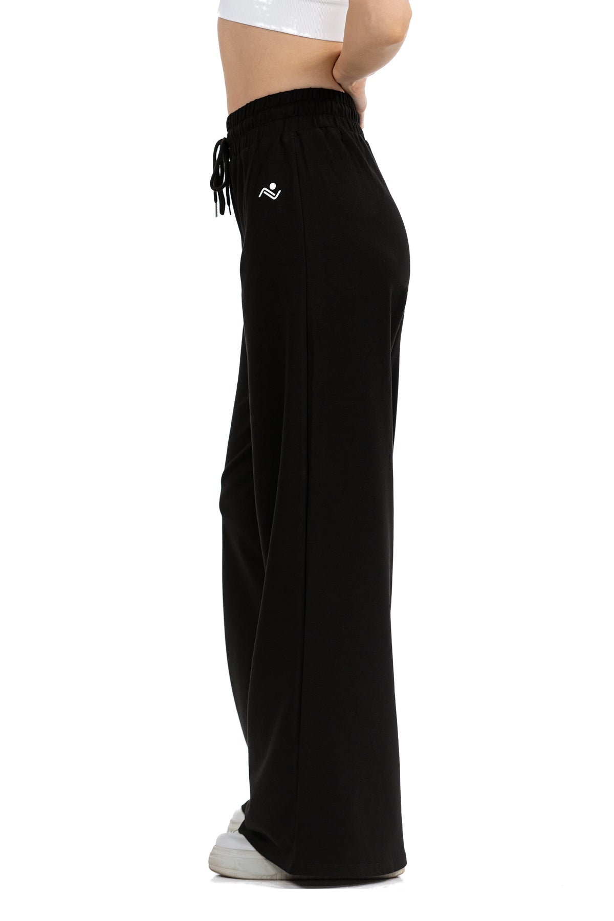 Low Fit Cotton Yoga Pants in Black, side profile view showing the drape from hip to hem, Ascendia