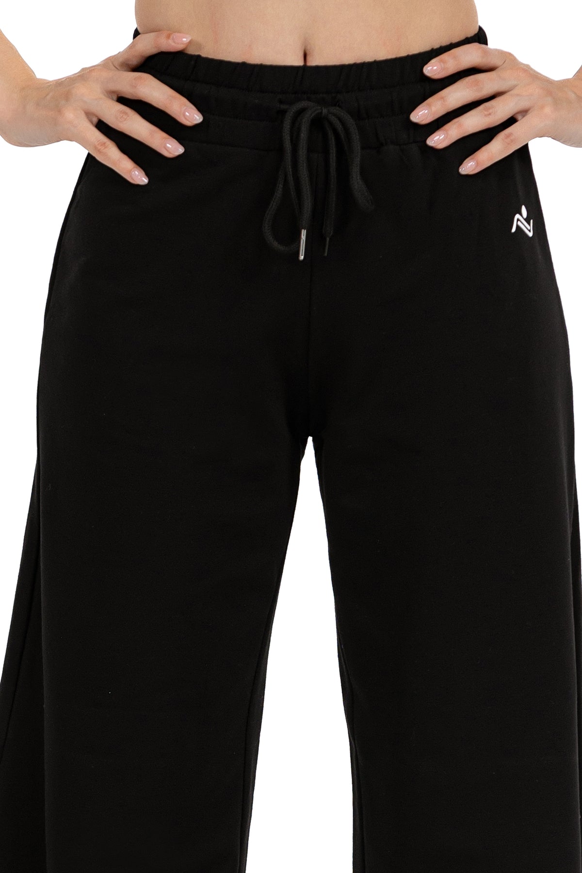 Low Fit Cotton Yoga Pants in Black, close view of the elasticated drawcord waistband and the Ascendia logo, Ascendia