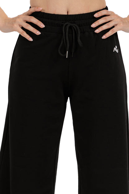 Low Fit Cotton Yoga Pants in Black, close view of the elasticated drawcord waistband and the Ascendia logo, Ascendia