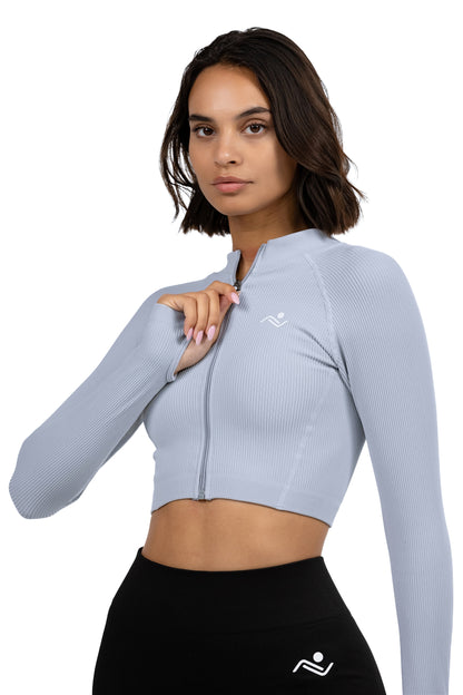 Seamless V-Cut Training Top in Ice Blue, three-quarter view on model, Ascendia