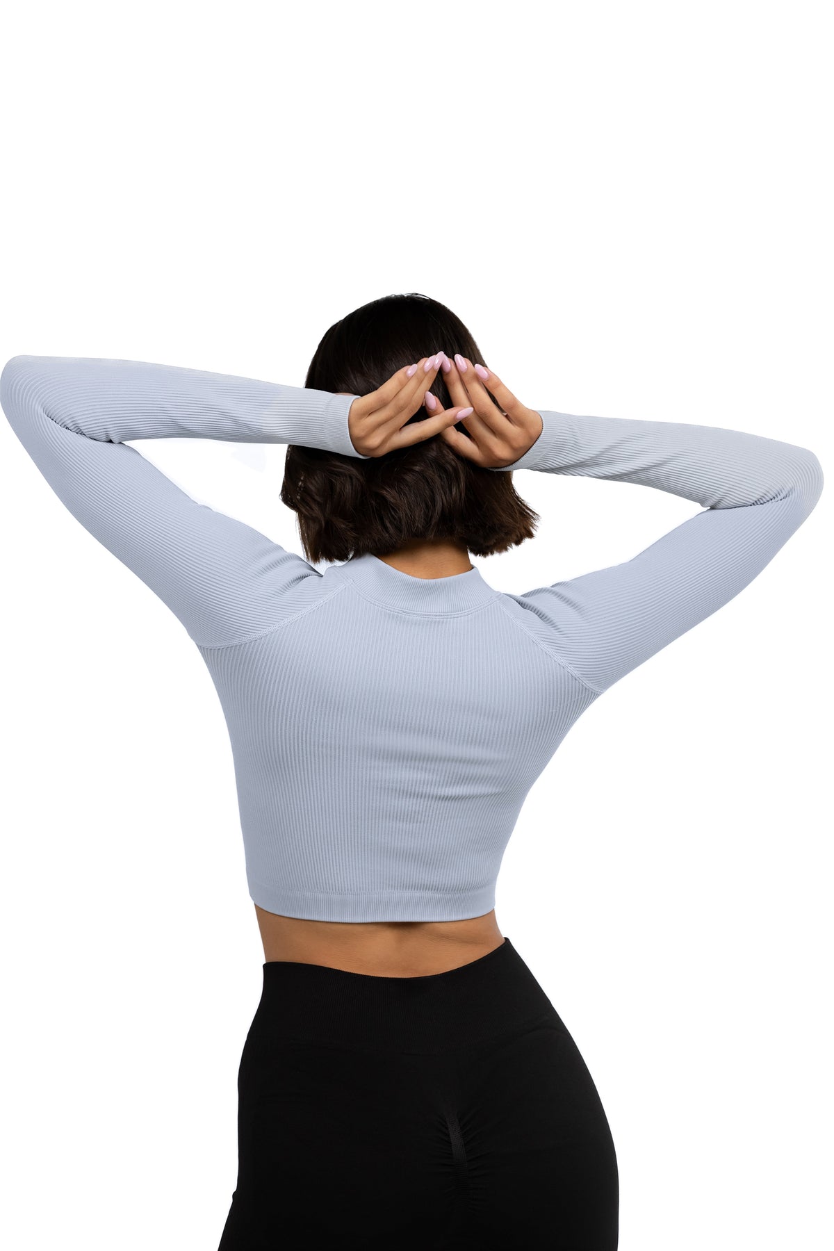 Seamless V-Cut Training Top in Ice Blue, back view on model, Ascendia